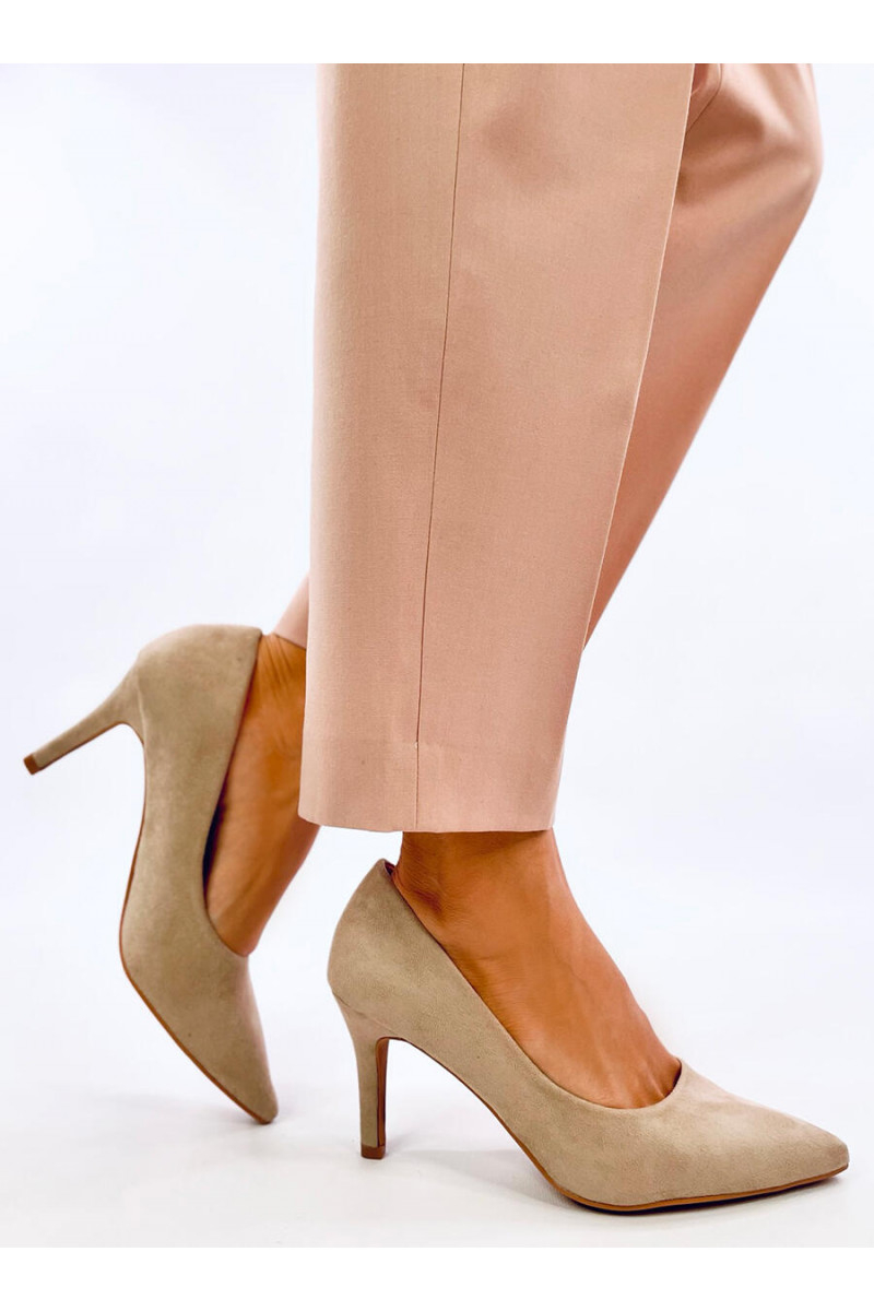 Khaki heels Cut Out Stock Images & Pictures - Alamy