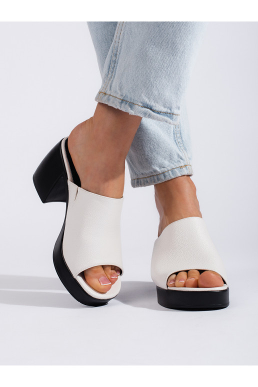 White color slippers   on the heel