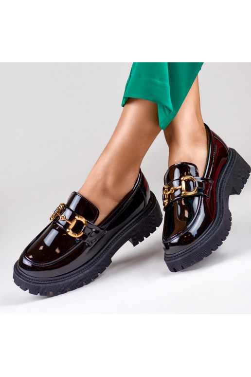 Patent black women's moccasins with decorative detail