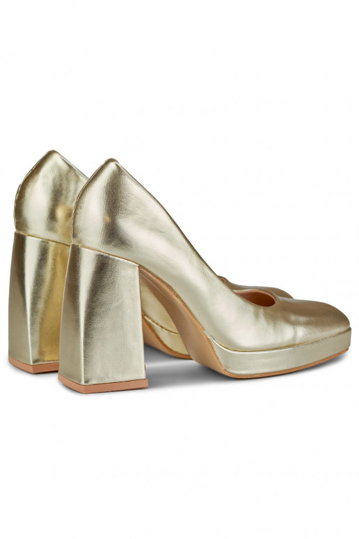High heels with a wide heel in gold...