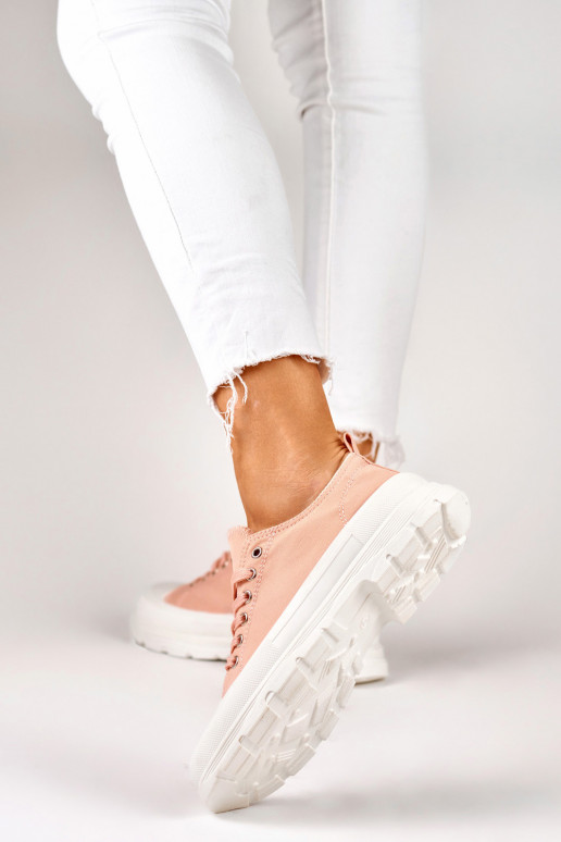 Pink sneakers on a low platform Pink sneakers on a low platform