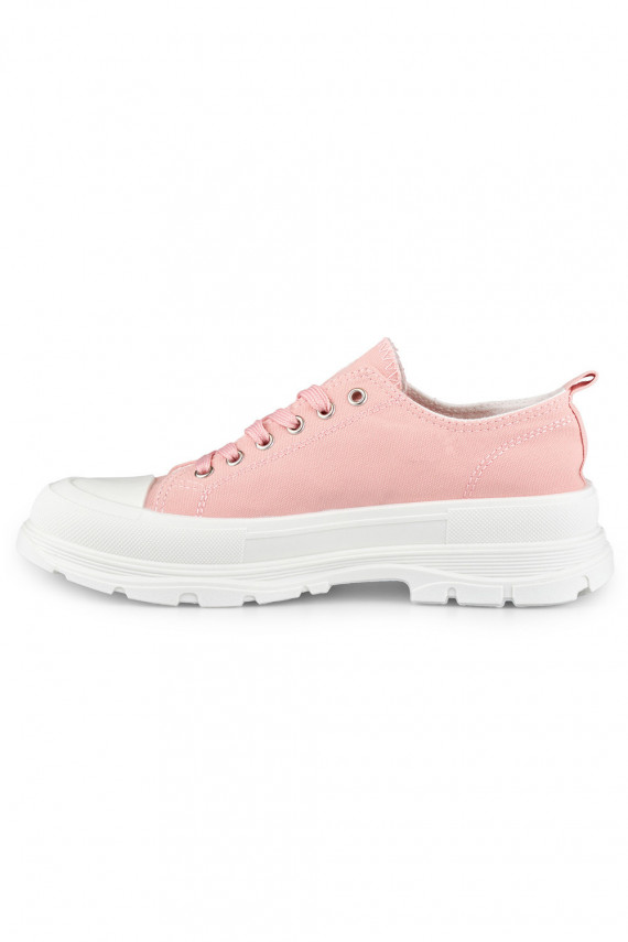 Pink sneakers on a low platform