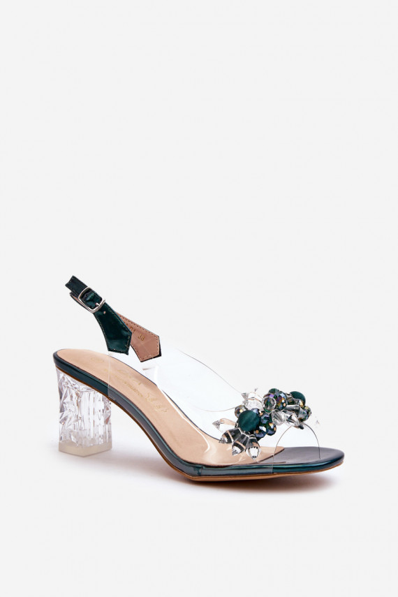 Transparent sandals on a heel with decorations in green D&A