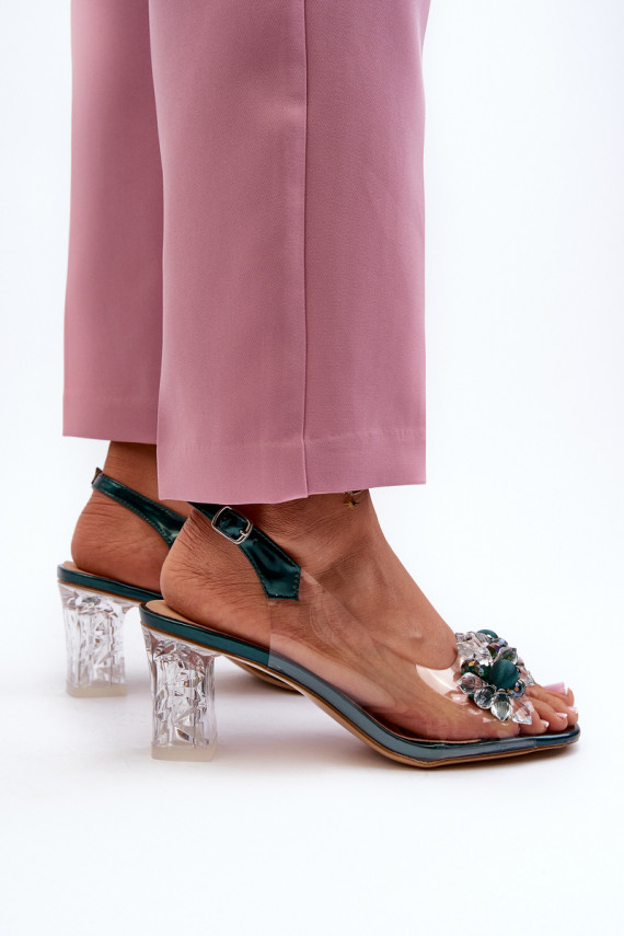Transparent sandals on a heel with decorations in green D&A
