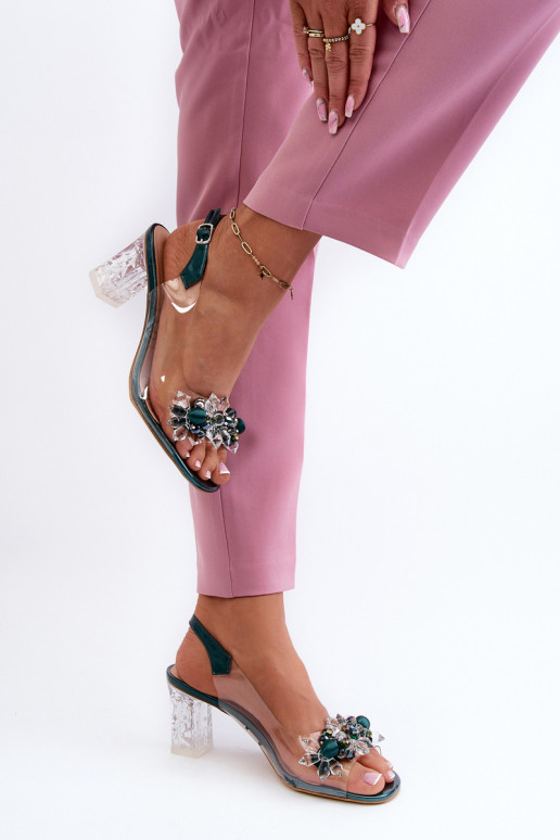 Transparent sandals on a heel with decorations in green D&A