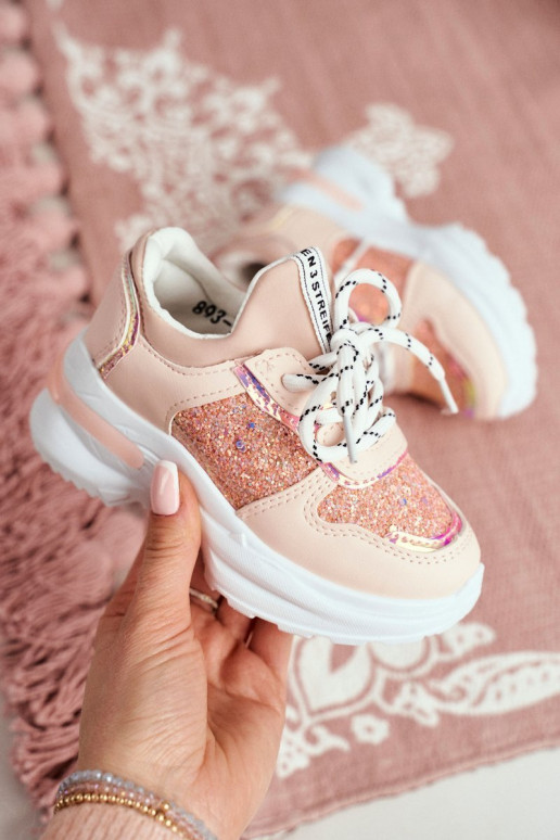 Children's sneakers with glitter in pink color