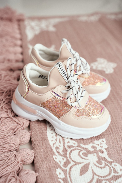 Children's sneakers with glitter in pink color