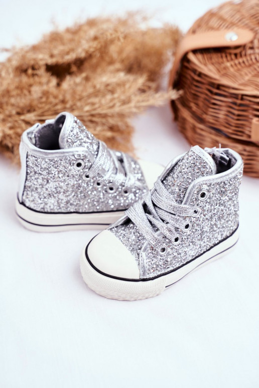 Children's leisure shoes in shiny silver color