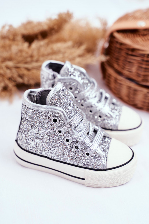 Children's leisure shoes in shiny silver color