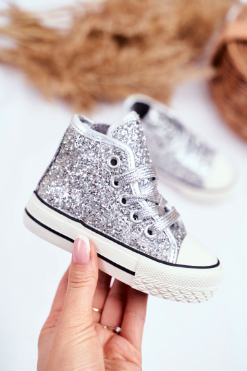 Children's leisure shoes in shiny silver color