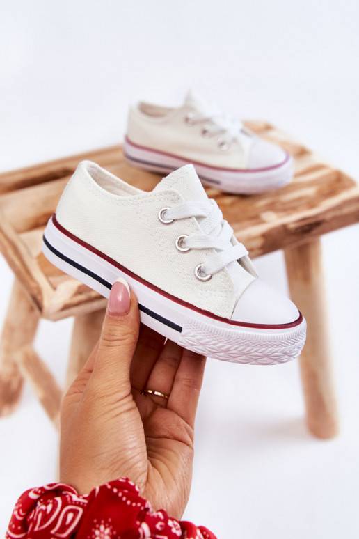 Classic children's sports shoes in white color