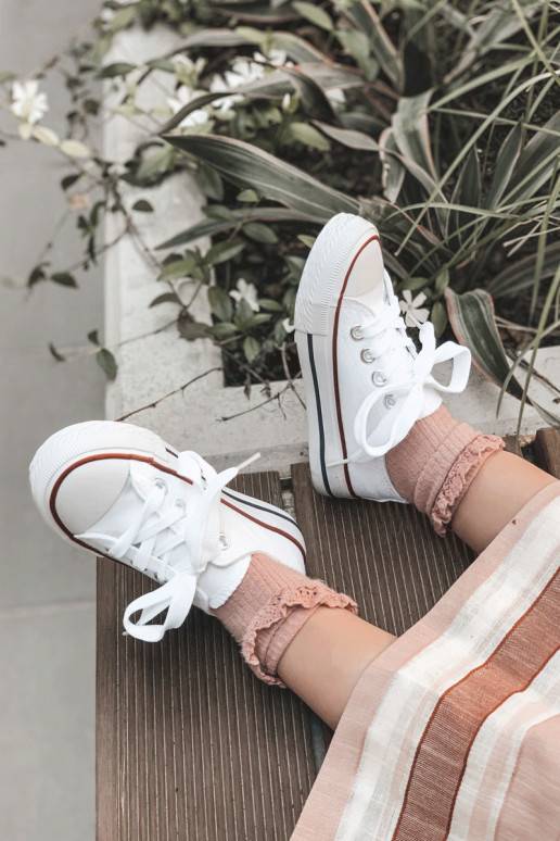 Classic children's sports shoes in white color