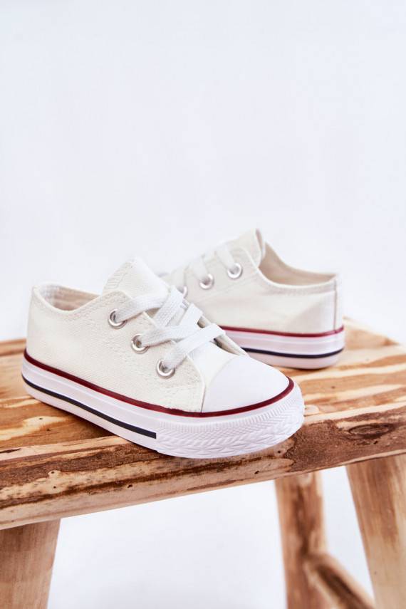 Classic children's sports shoes in white color