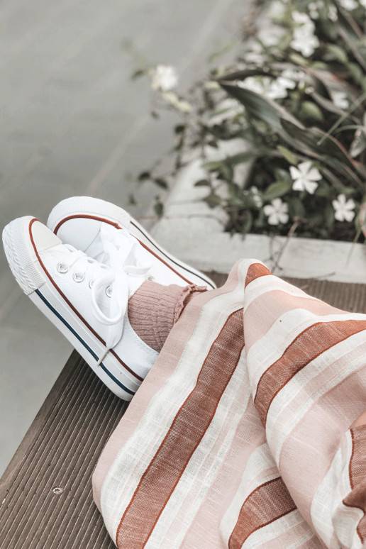 Classic children's sports shoes in white color