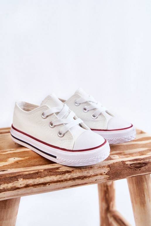 Classic children's sports shoes in white color