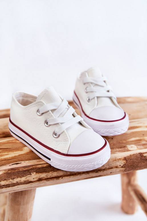 Classic children's sports shoes in white color