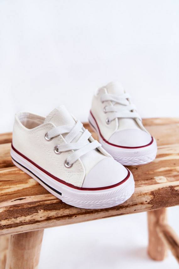 Classic children's sports shoes in white color
