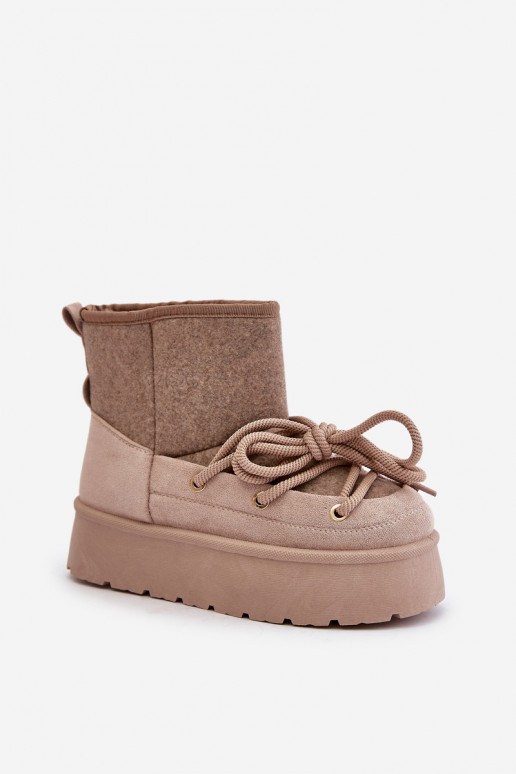 Snow boots with stylish details with platform in beige