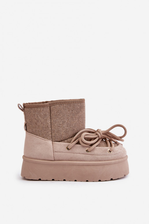 Snow boots with stylish details with platform in beige
