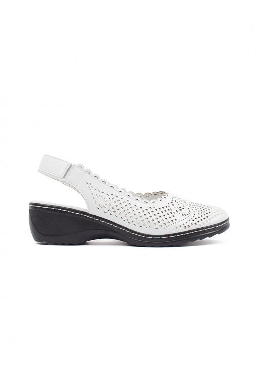 White color sandals on a wedge with an open heel
