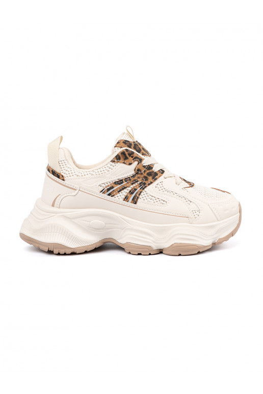 Sneakers model shoes on a thick sole leopard print
