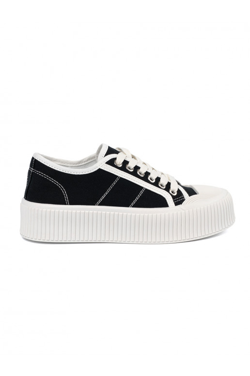 Black sports style shoes laced on a thick sole