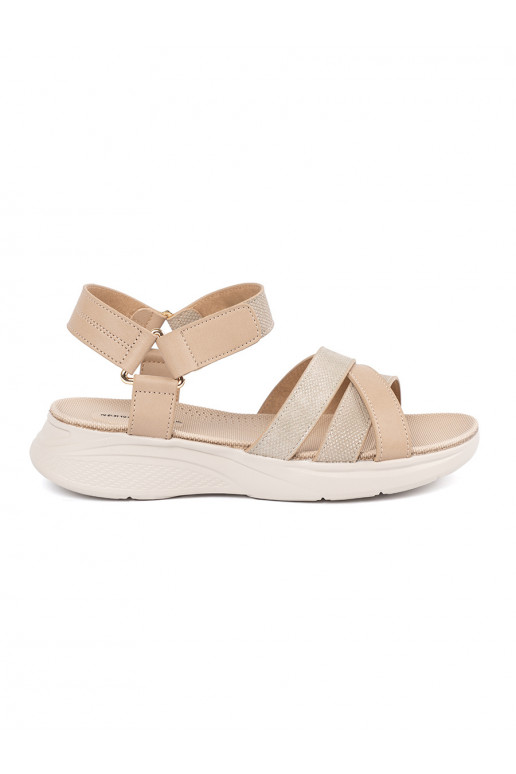 ivory sandals on a white platform