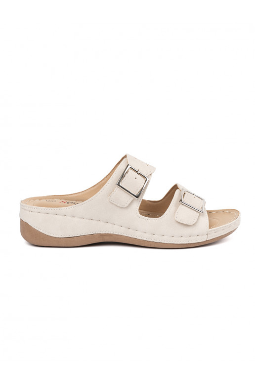 sandals on a low wedge with buckles light beige