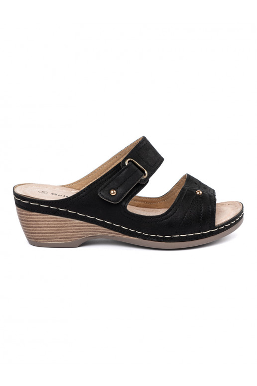 black sandals on a wedge