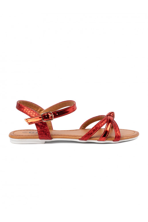 red sandals with an animal motif