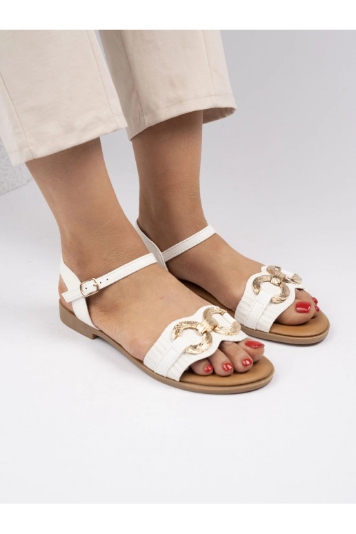 sandals flat with a decorative buckle leather White