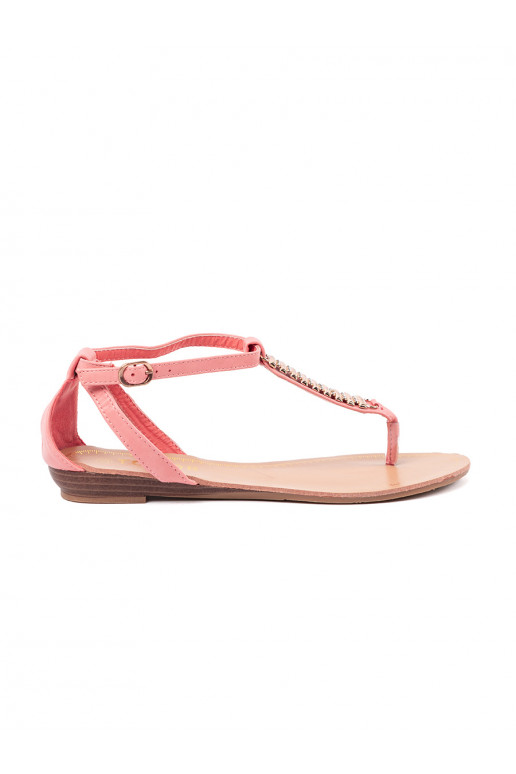 pink sandals with gold decorations
