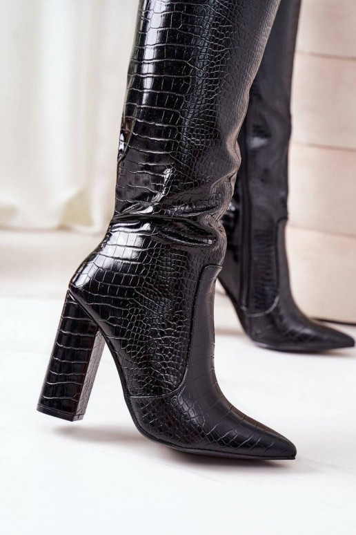 Trendy Boots On A Bar Black Constancy