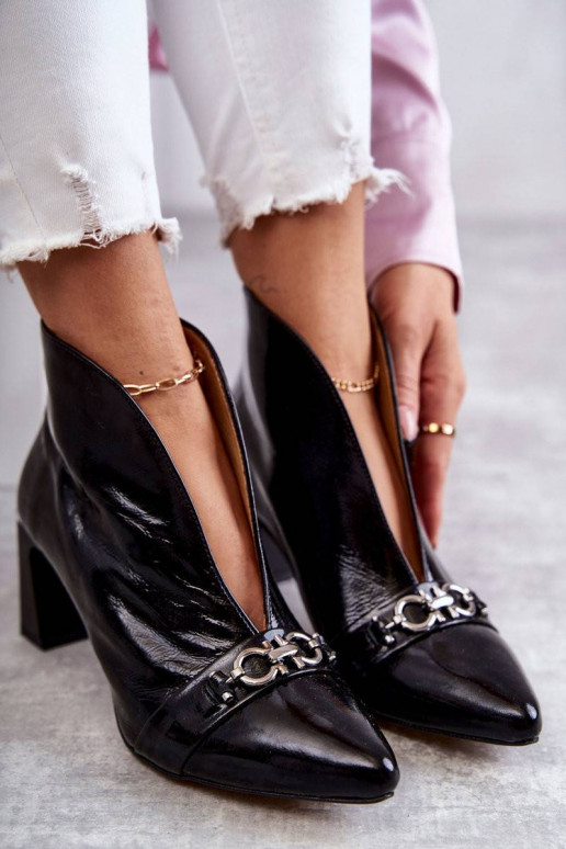 Leather boots on a post Black