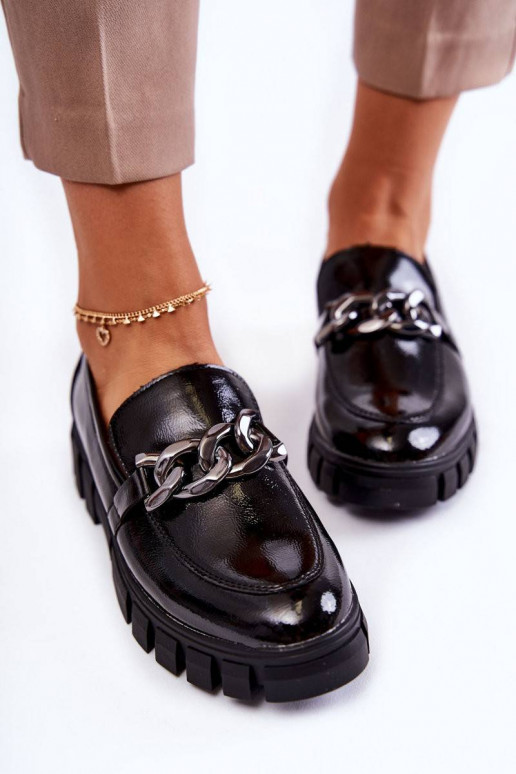 Lacquered Loafers On The Platform...