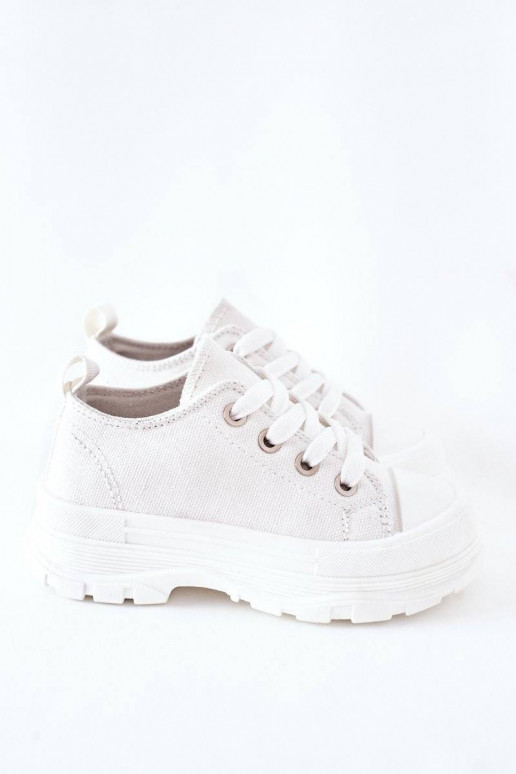 Children's Sneakers On A Platform...