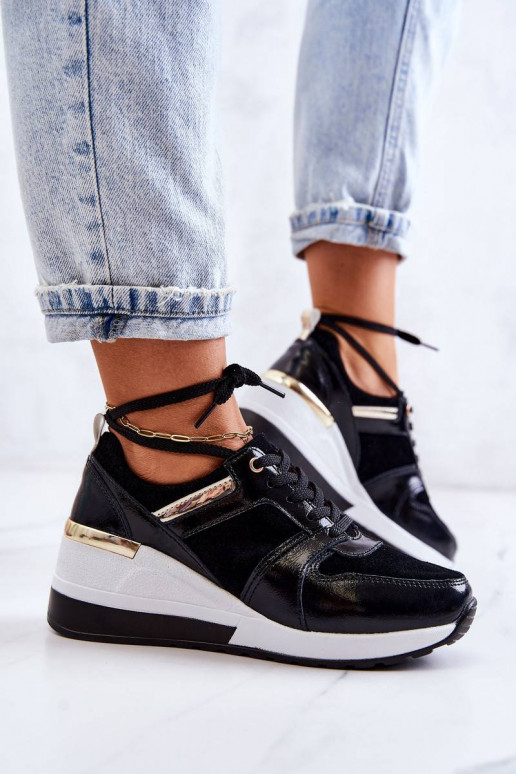 Leather sports shoes on a wedge Black...