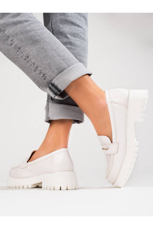 White color loafersy with platform...