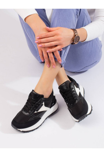 Black sneakers with a high...