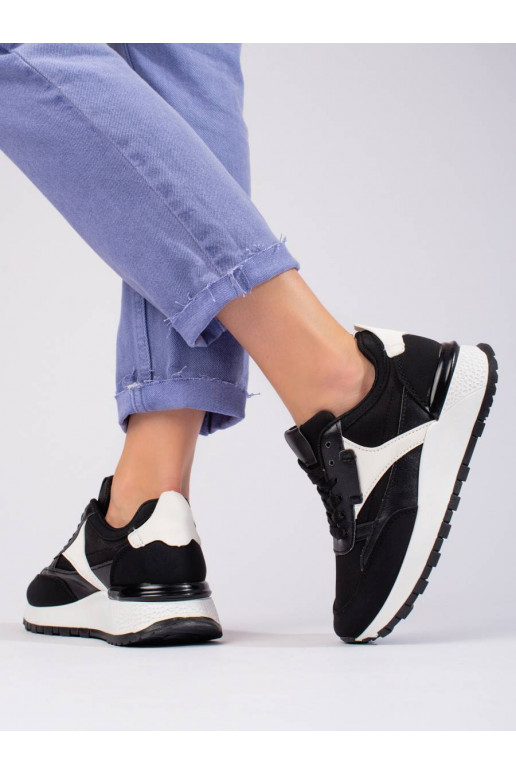 Black sneakers with a high platform...