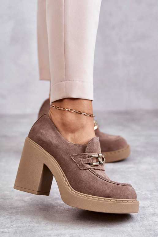 Suede shoes on a massive post Beige...