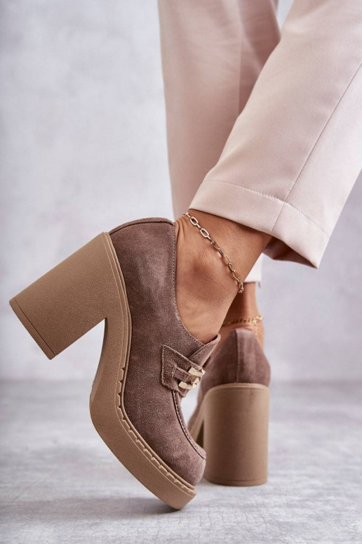 Suede shoes on a massive post Beige...