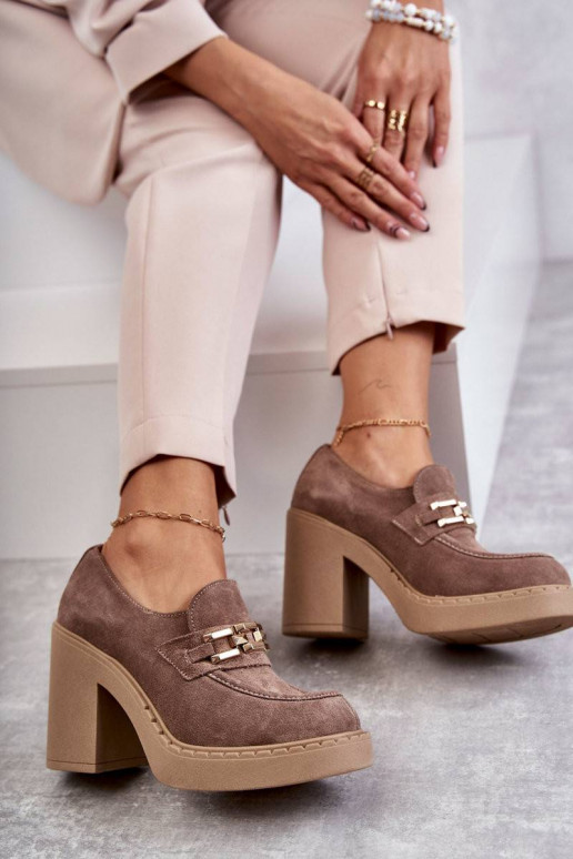 Suede shoes on a massive post Beige...