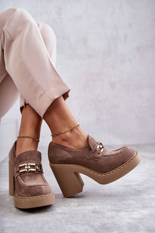 Suede shoes on a massive post Beige...