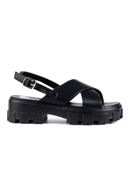 Black sandals on a thick platform...