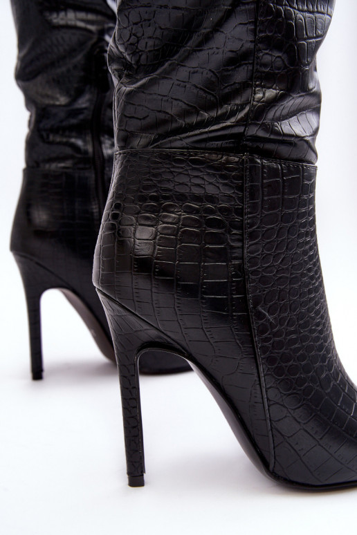 Long boots with thin heels in black...