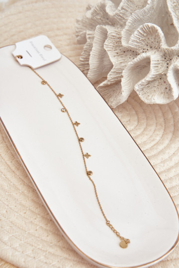 The bracelet is gold