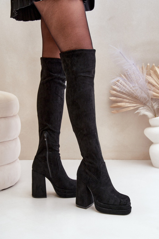 Knee High Heeled And Platform Boots...