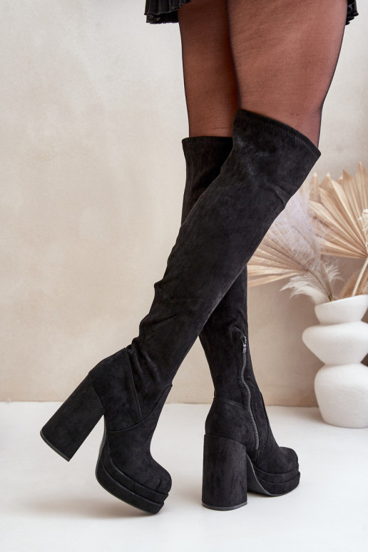 Knee High Heeled And Platform Boots...