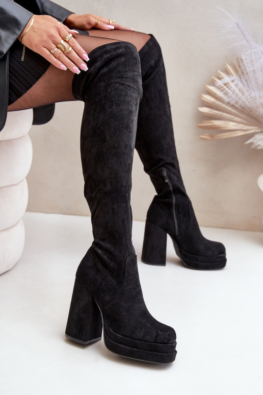 Knee High Heeled And Platform Boots...
